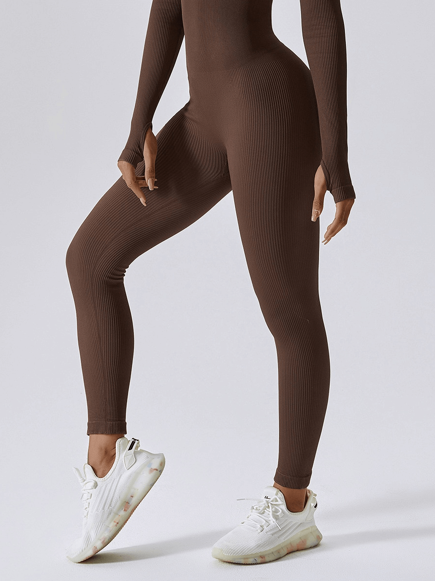 Brown seamless yoga suit with thumb holes and white sneakers, designed for women’s fitness and yoga workouts - SF1287